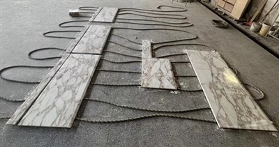 Calacatta gullmarmor benkeplate