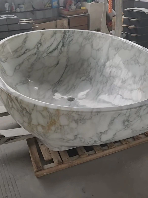 marble bathroom with tub